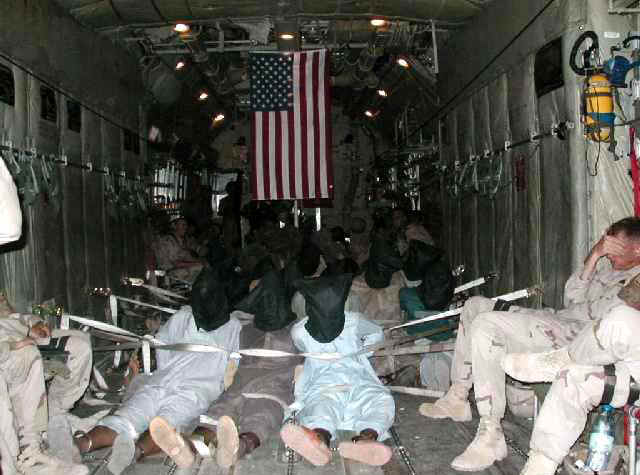 C-130 Prisoner Transport to Guantanamo Bay, Cuba--Images leaked to international news agencies in 2002 by anonymous source.